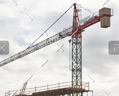 building-in-progress-and-crane-machinery-K-1